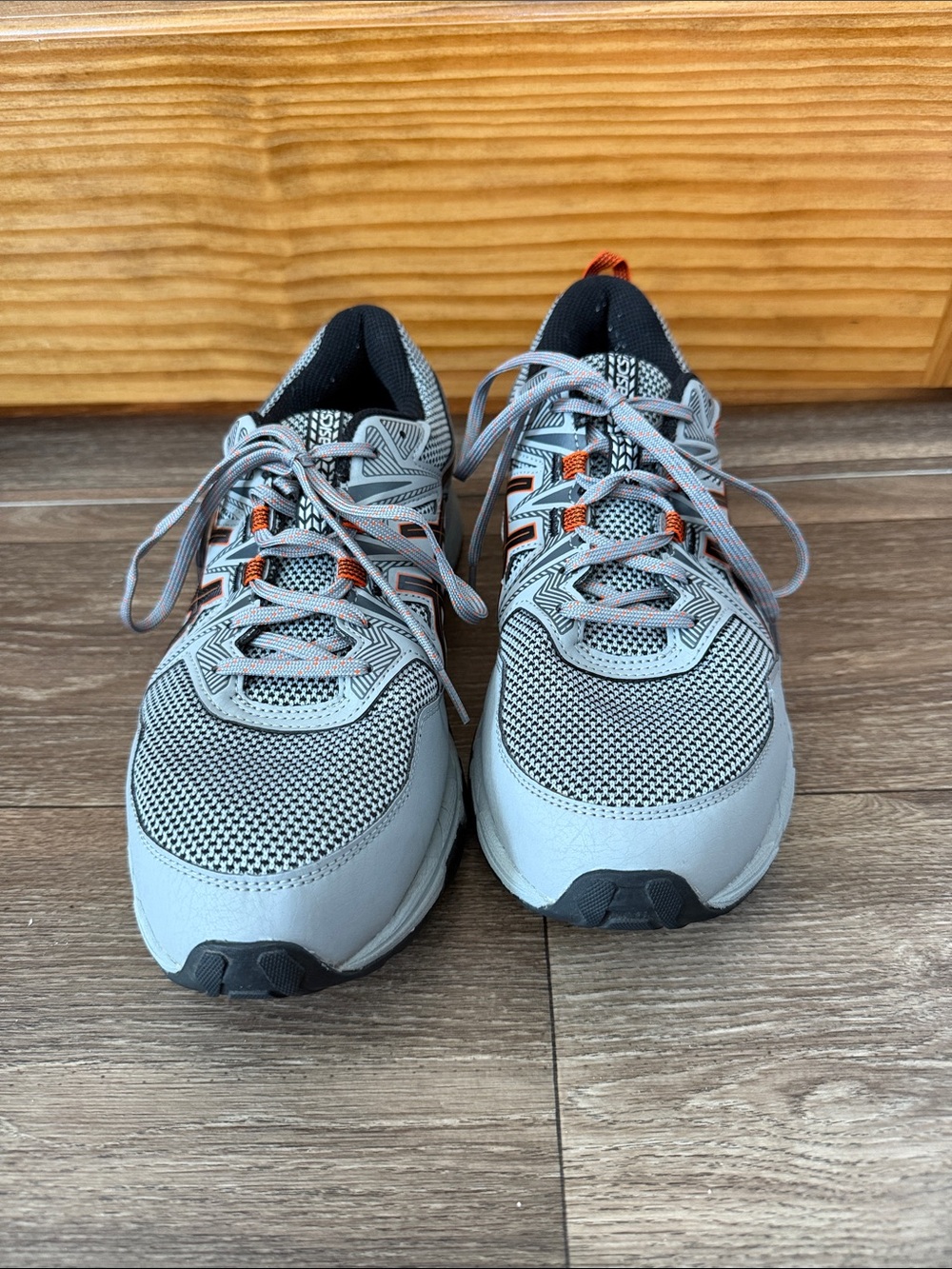 Men’s Asics Light Gray and Black Running Sneakers with Orange Accents- Size 10